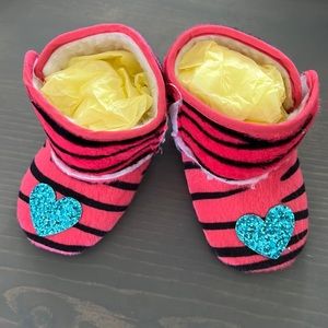 Hot pink zebra with blue glitter heart faux UGGs, 12 to 18 months. Brand new.